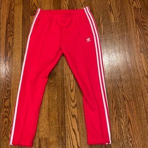 Red adidas track suit pants